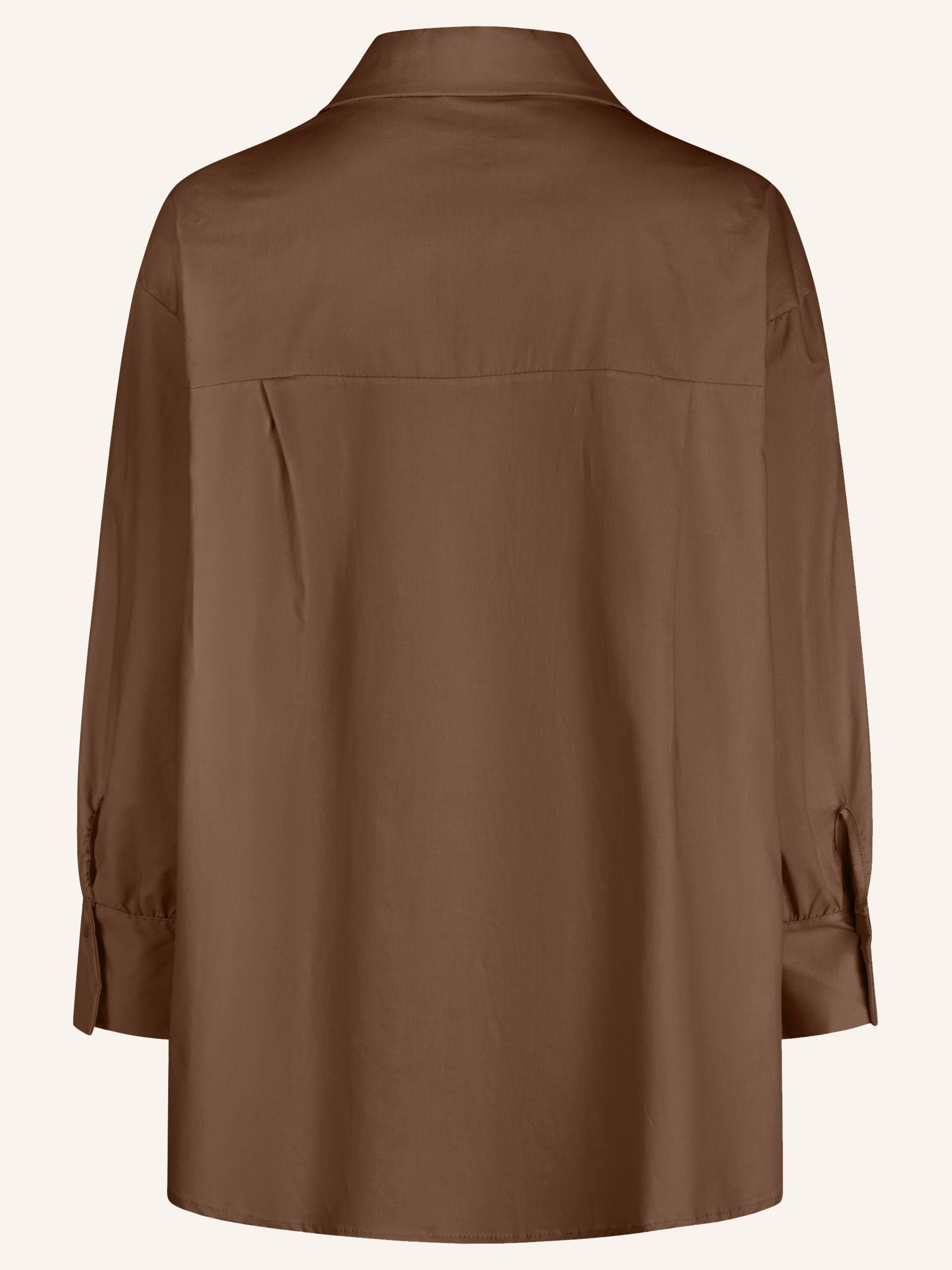 Oversize-Bluse mit modischen Schmuckdetails
