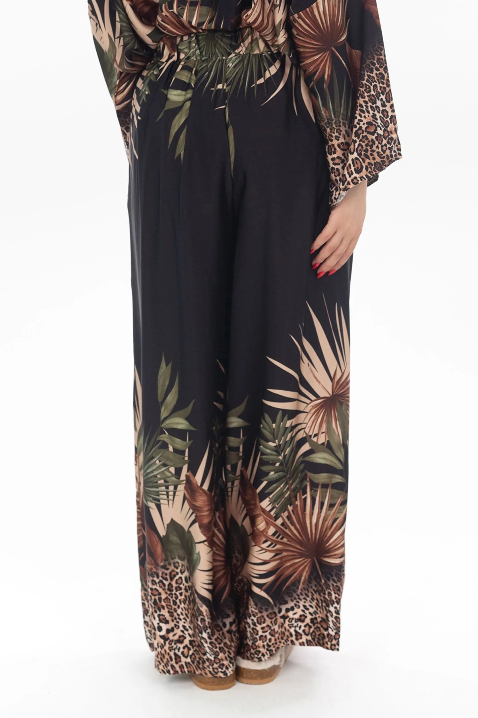 Pants with tropical and leo pattern