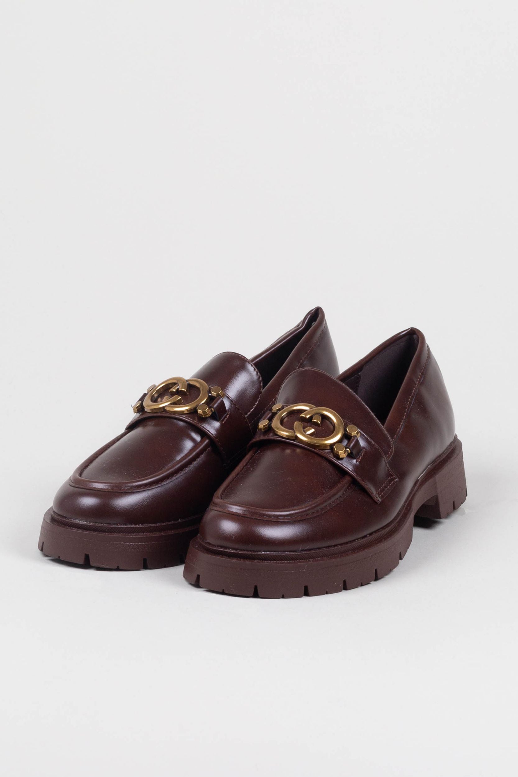 Loafer with a golden buckle