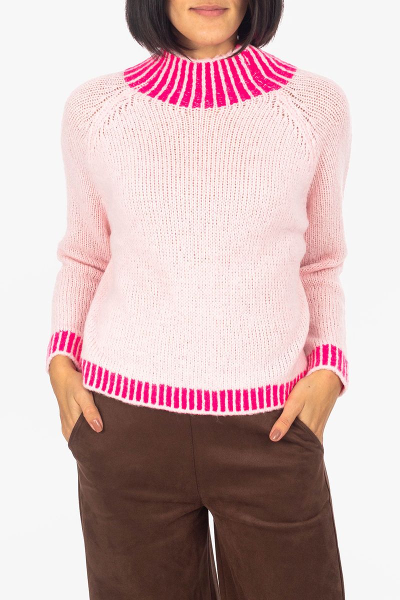 Sweater with knitting patterns on collar and cuffs