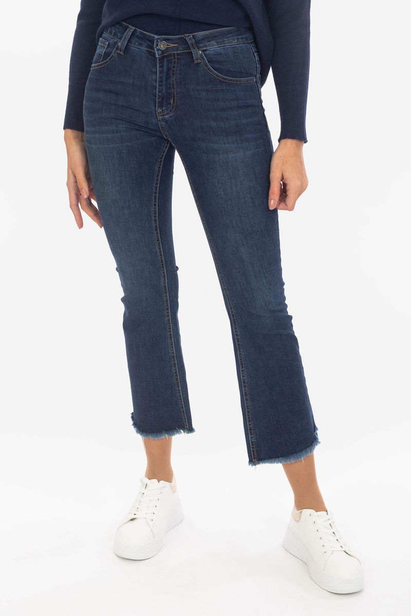 High-tail skinny jeans met een knoopbalk