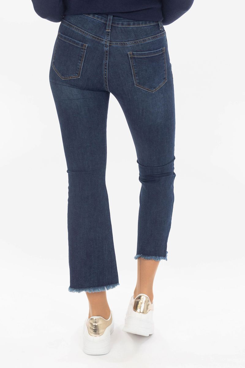 High-tail skinny jeans met een knoopbalk