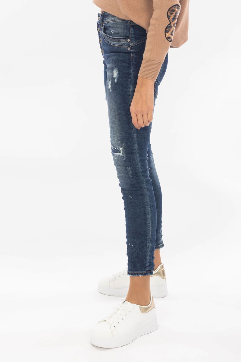 High-waist jeans with a button placket and used look